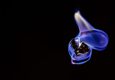 blue hydrogen flame on black background